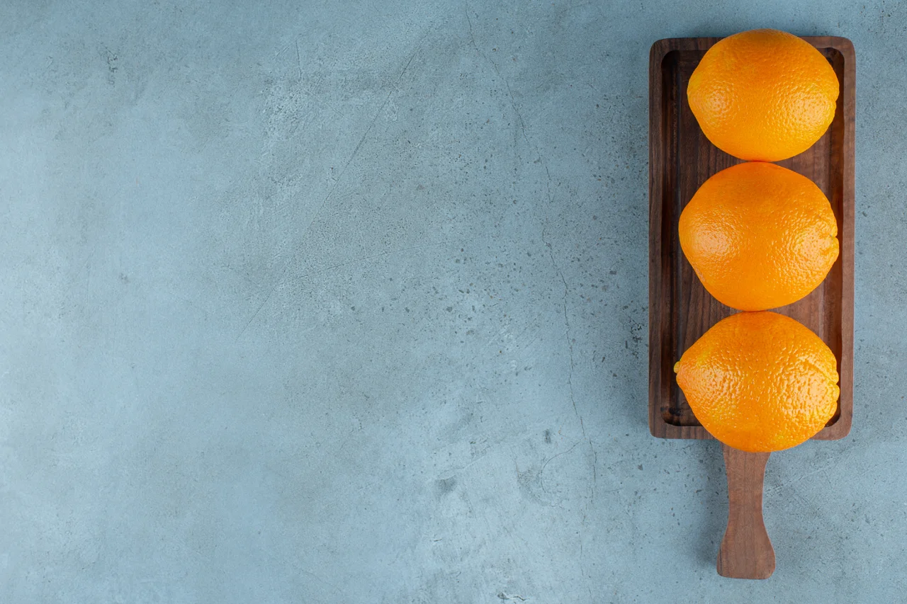 Oranges on a board